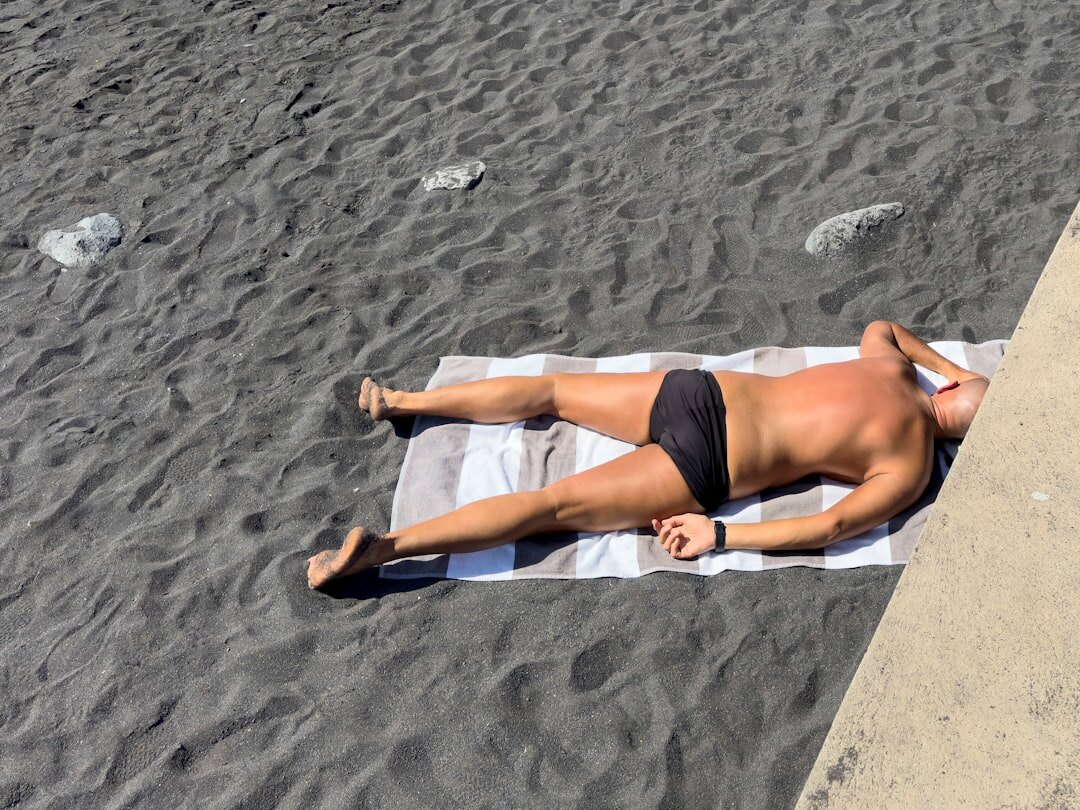 celebrity relaxing on beach
